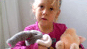a girl with two stuffed animals